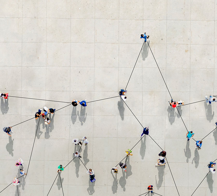 Network of interconnected people with one standout.